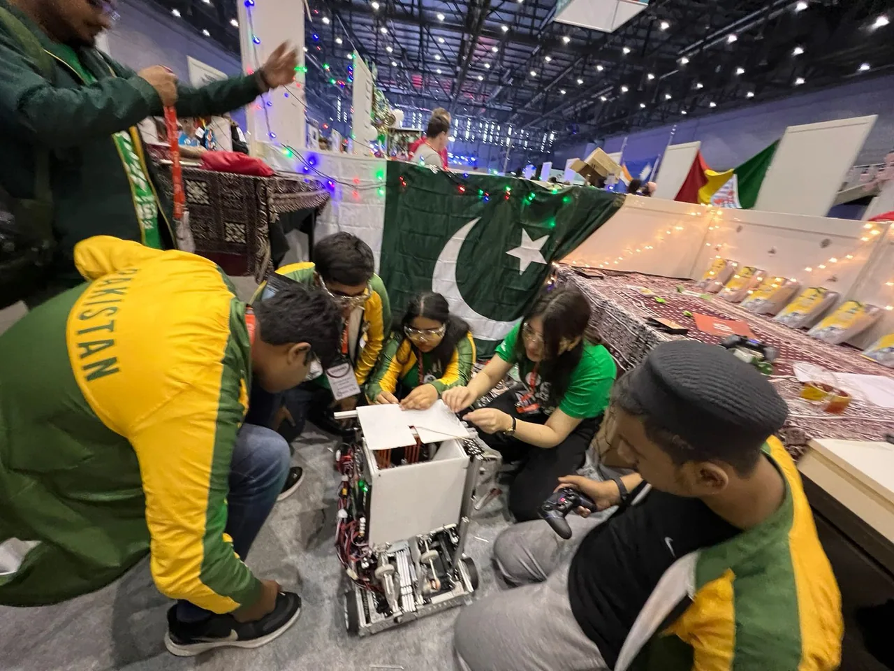 Team Pakistan preparing a robot for international competition